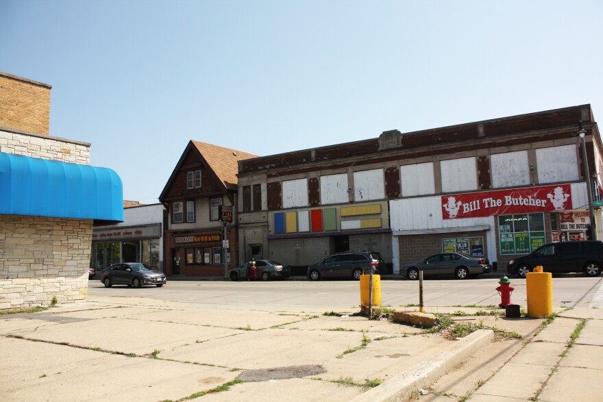 an empty lot beside a busy street