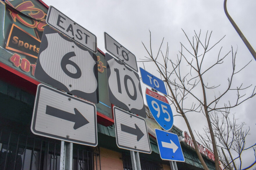 Signs pointing towards Routes 6 and 10, along with Interstate 95, in Providence’s Silver Lake neighborhood.