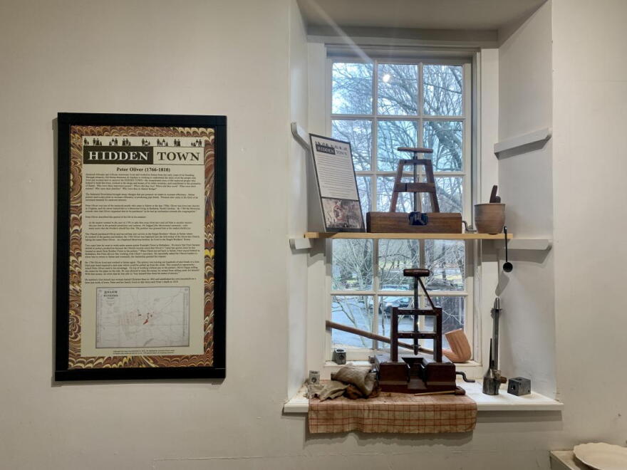  Text panels telling the stories of enslaved people who lived and worked in Salem.