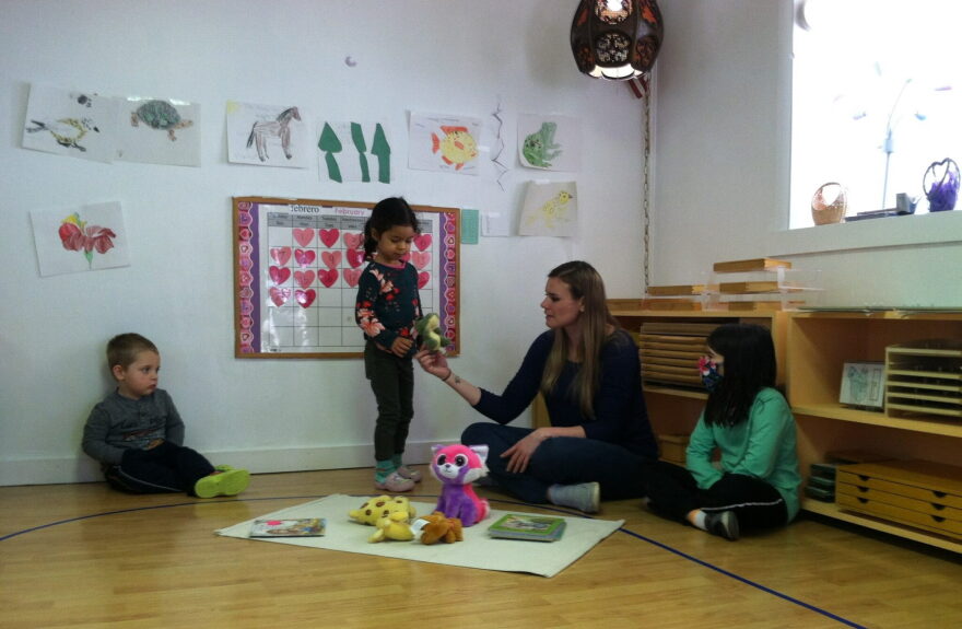 A teacher at Vista Montessori School in Boise interacts with children at the center. (courtesy of Melissa Buck)