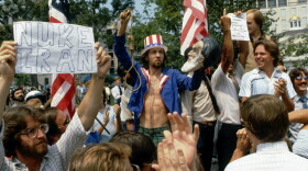 Dec. 25, 1979 - Washington, District of Columbia, U.S - Anti-Khomeini demostration in downtown DC. Protesting the takover of the US embassy in Tehran and of the holding hostage the 54 embassy employees. Police arrest one demonstrator and others yell at the police officers for protecting the Iranian students who were marching in supoort of the Khomeini government. (Credit Image: � Mark Reinstein/ZUMA Wire)