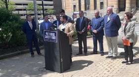 Local officials stand outside Buffalo City Hall to discuss public safety