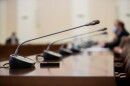 Conference room or seminar meeting room in business event. Session of Government. Academic classroom training course in lecture hall. blur abstract background. working in modern bright office indoor.