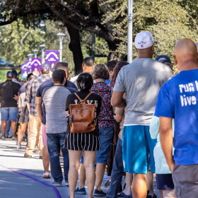 Voters line up to cast their votes at Northwest Vista College on Monday, Oct. 21, 2024.