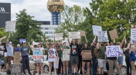 Protestors gather in Downtown Knoxville on Saturday, June 14, 2025. The demonstrations in Knoxville and other cities in East Tennessee were part of a larger, nationwide movement known as “No Kings Day,” which sought to levy criticism at Trump on his birthday while also drawing attention away from a large military parade in D.C. which is scheduled for Saturday evening.