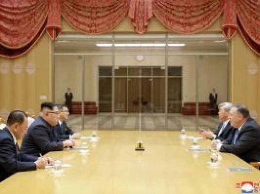 Secretary of State Mike Pompeo and CIA official Andrew Kim, both at right, meeting with North Korean leader Kim Jong Un on May 9 in the capital Pyongyang.