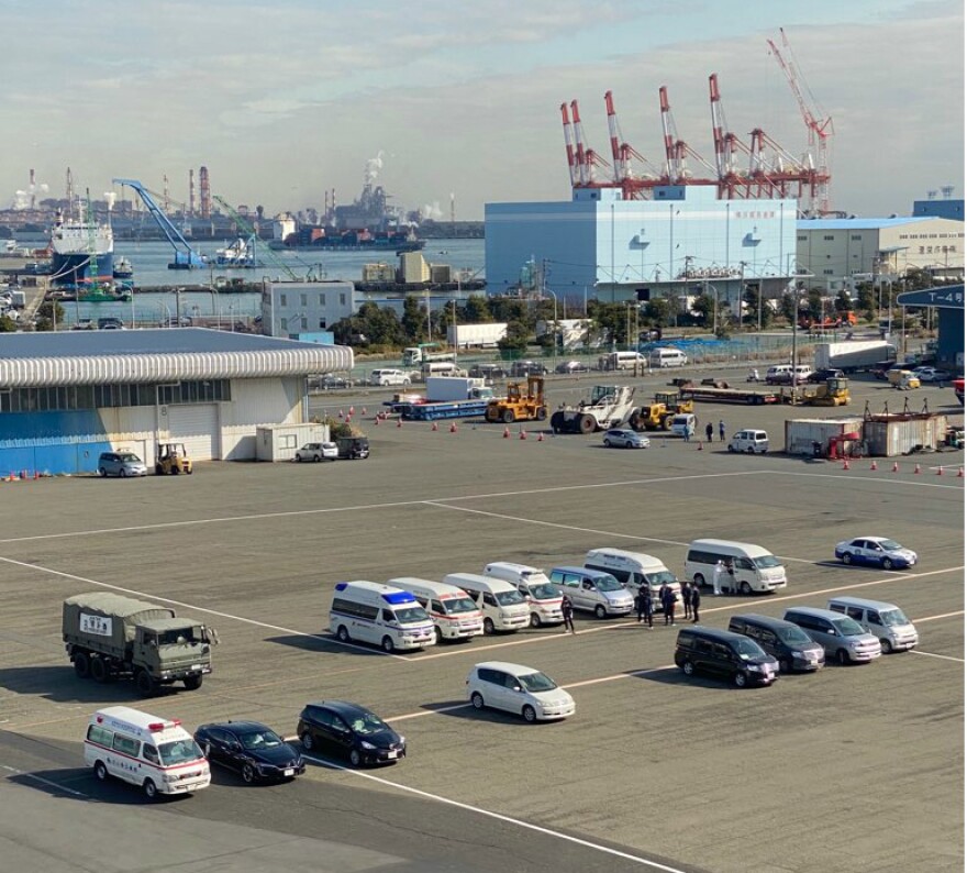 Ambulances lined up outside the Diamond Princess in port, waiting to transport passengers with the coronavirus to a Japanese hospital. Passengers who hadn't tested positive for the virus remained isolated in their cabins on the ship.