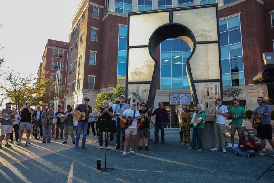 Community members and family and friends of Owen Ramsingh gather for a rally at the Daniel Boone City Building. Musicians showed up to play music in support of Ramsingh, who runs security at The Blue Note.