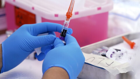 A flu vaccine is readied at the L.A. Care and Blue Shield of California Promise Health Plans' Community Resource Center. (AP Photo/Mark J. Terrill, File)