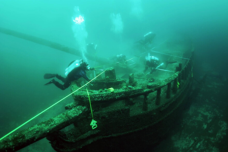 Maritime archaeologists exploring the "Christmas Tree" shipwreck in 2011.