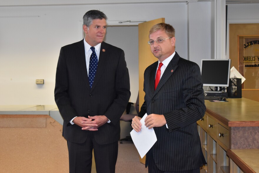 Tazewell County Clerk John Ackerman, right, shows Congressman Darin Lahood the remodeling projects the clerk's office will undergo. It's an effort to improve the physical security of voter information.
