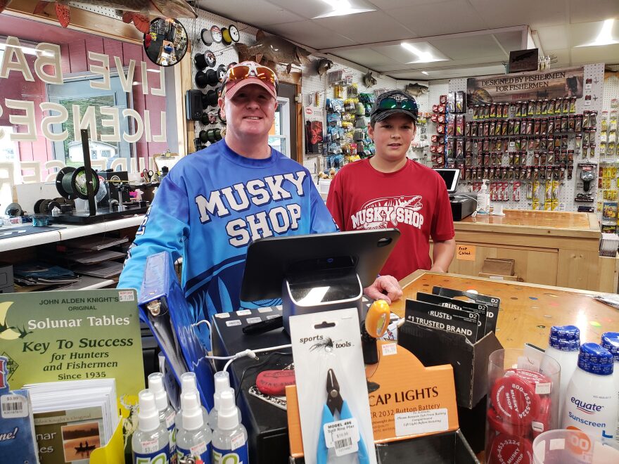 Jim Stewart, owner of Rollin & Helen's Musky Shop in Minocqua, Wisconsin, which bills itself as the 'world's largest musky shop,' and his associate Tyler are ready to outfit locals and tourists for musky fishing adventures.