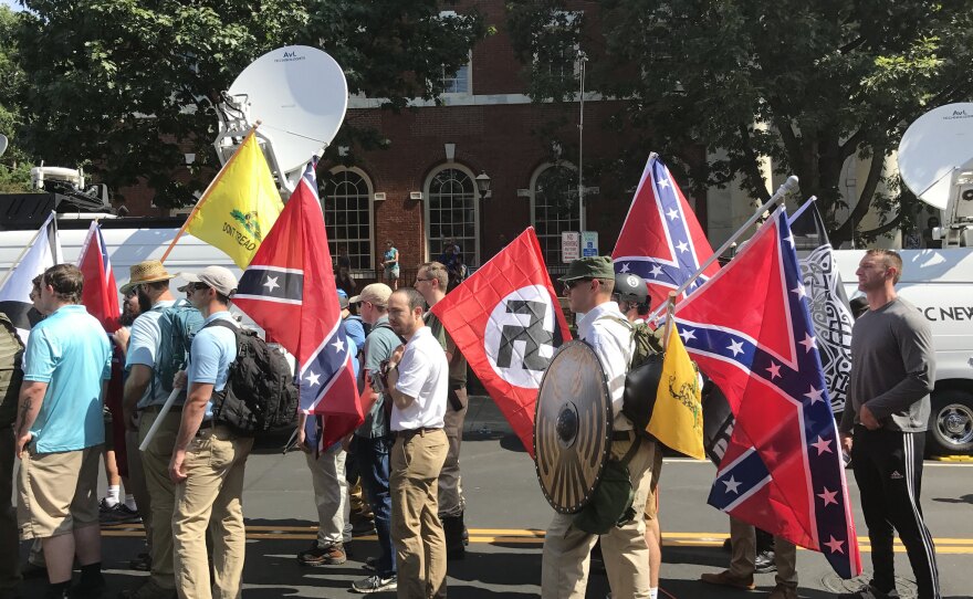 South Carolina passed a law to counter anti-Semitism on college campuses, following a violent white supremacist rally last year in Charlottesville. Pictured, rally participants prepare to enter Emancipation Park on August 12, 2017.