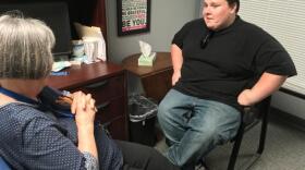 Cody Goodwin sits down for a session with his counselor, Mary Bitterman, at a ReDiscover clinic in Kansas City. 