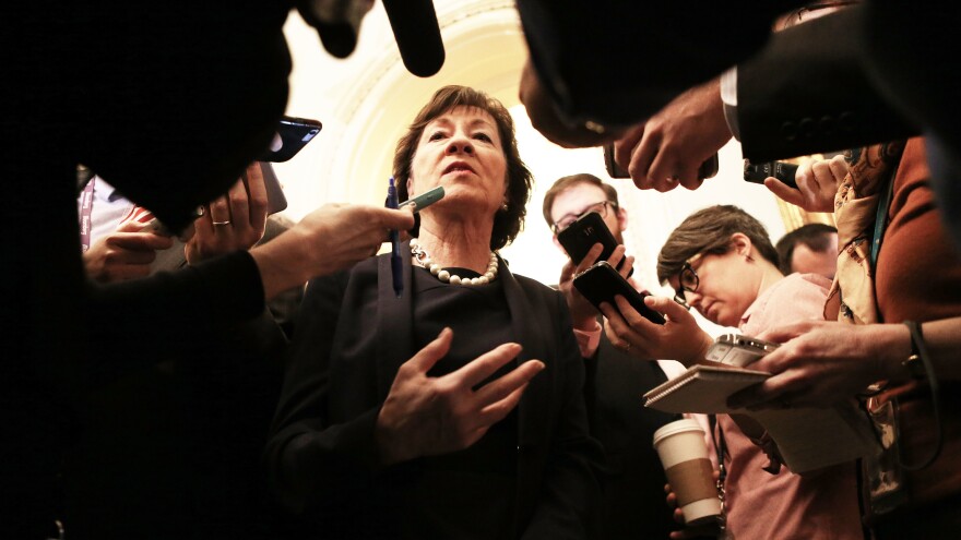 Maine Sen. Susan Collins speaks to the media after voting against Betsy DeVos as education secretary on Capitol Hill on Feb. 7.