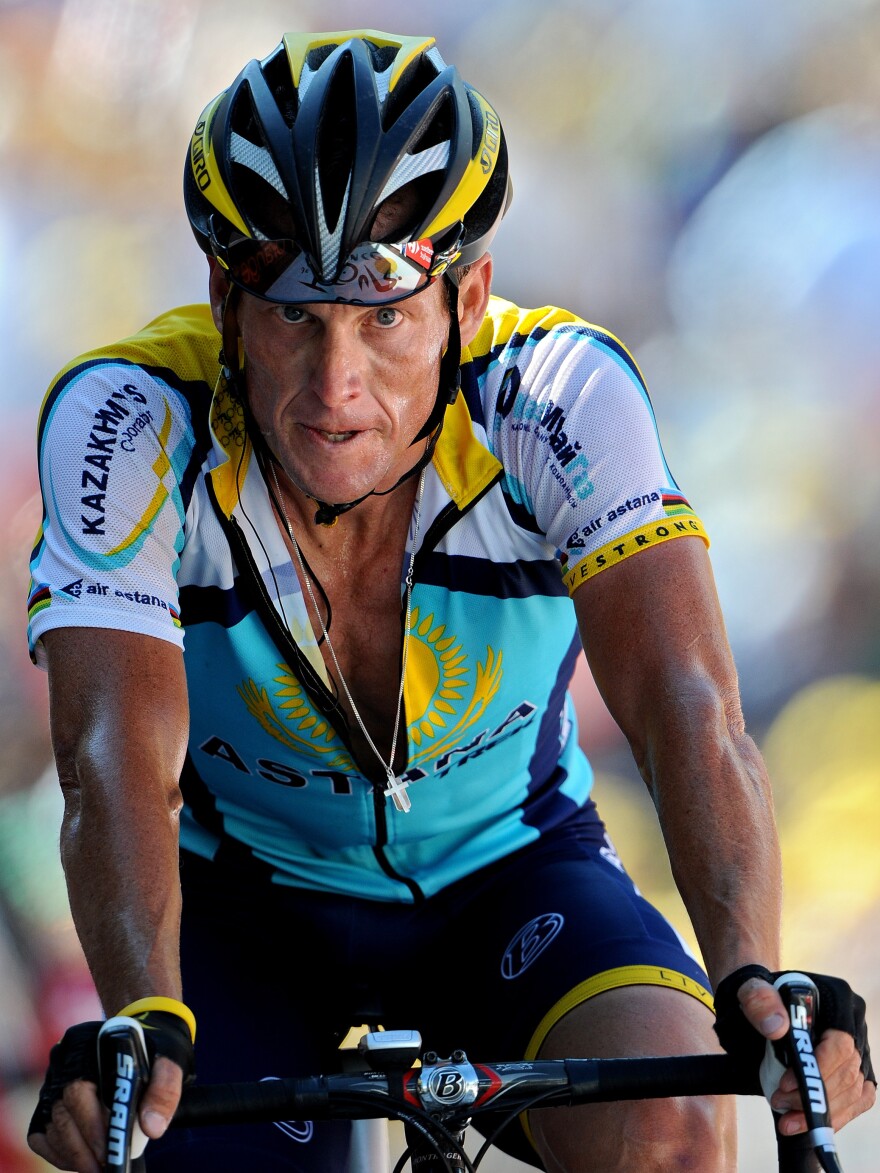 Lance Armstrong crosses the finish line at the end of stage 15 of the 2009 Tour de France from Pontarlier to Verbier on July 19, 2009 in Verbier, Switzerland. Armstrong has admitted to using the anemia drug known as EPO.