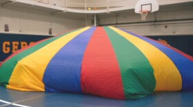 large, colorful gym parachute