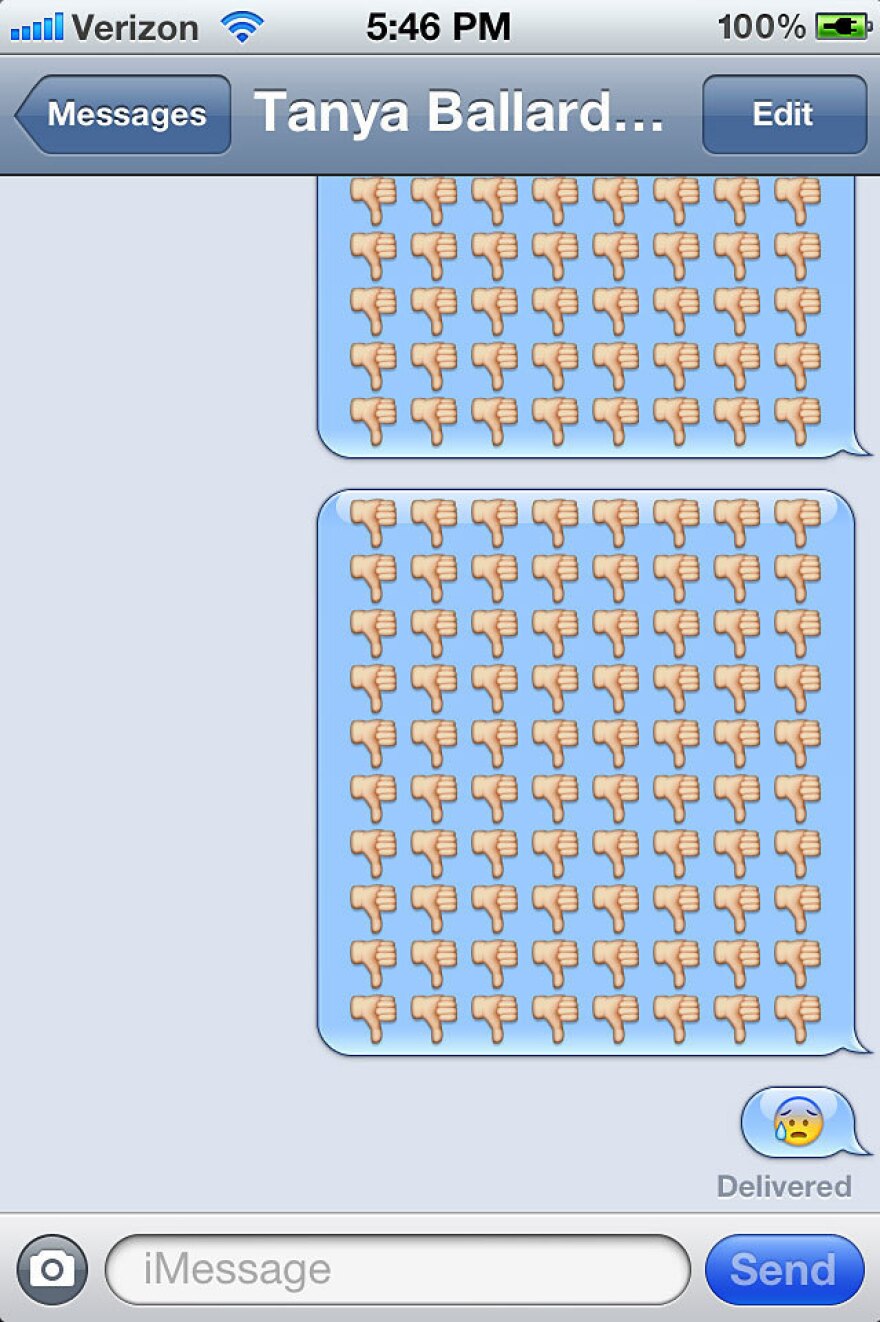A screengrab of several thumbs down and a weeping smiley face.