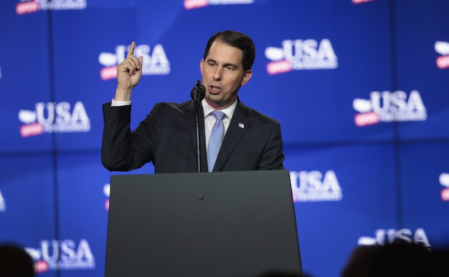 Gov. Scott Walker, R-Wis., speaks at a groundbreaking ceremony for the Foxconn factory complex on June 28 in Mount Pleasant, Wis.