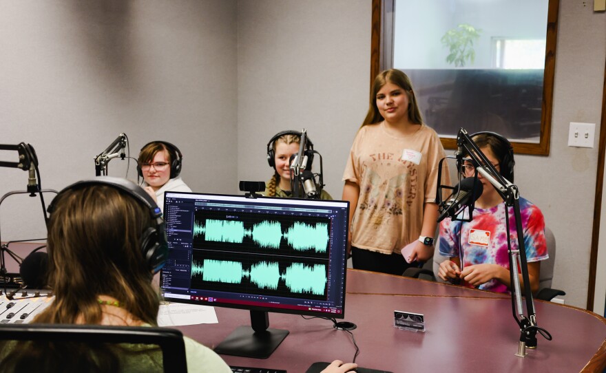 Student Integra Winkelman learns radio production software.