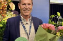 Dr. Marcus Duda accepts his innovation award.