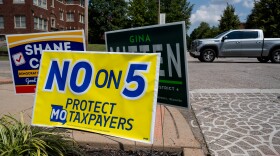 A yard sign advocating against Amendment 5 is displayed outside of Wild Carrot on Tuesday, Aug. 4, 2026, in St. Louis’ Shaw neighborhod.