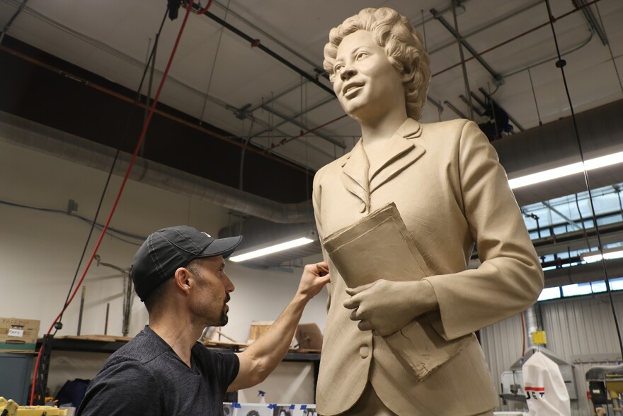 Sculptor Benjamin Victor works on his clay model of Daisy Bates Tuesday at the University of Arkansas at Little Rock's Windgate Center of Art + Design.