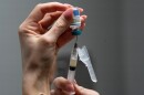 A nurse prepares a combination measles, mumps and rubella vaccine for a patient at Tiger Pediatrics in Easley, S.C., March 17, 2026.