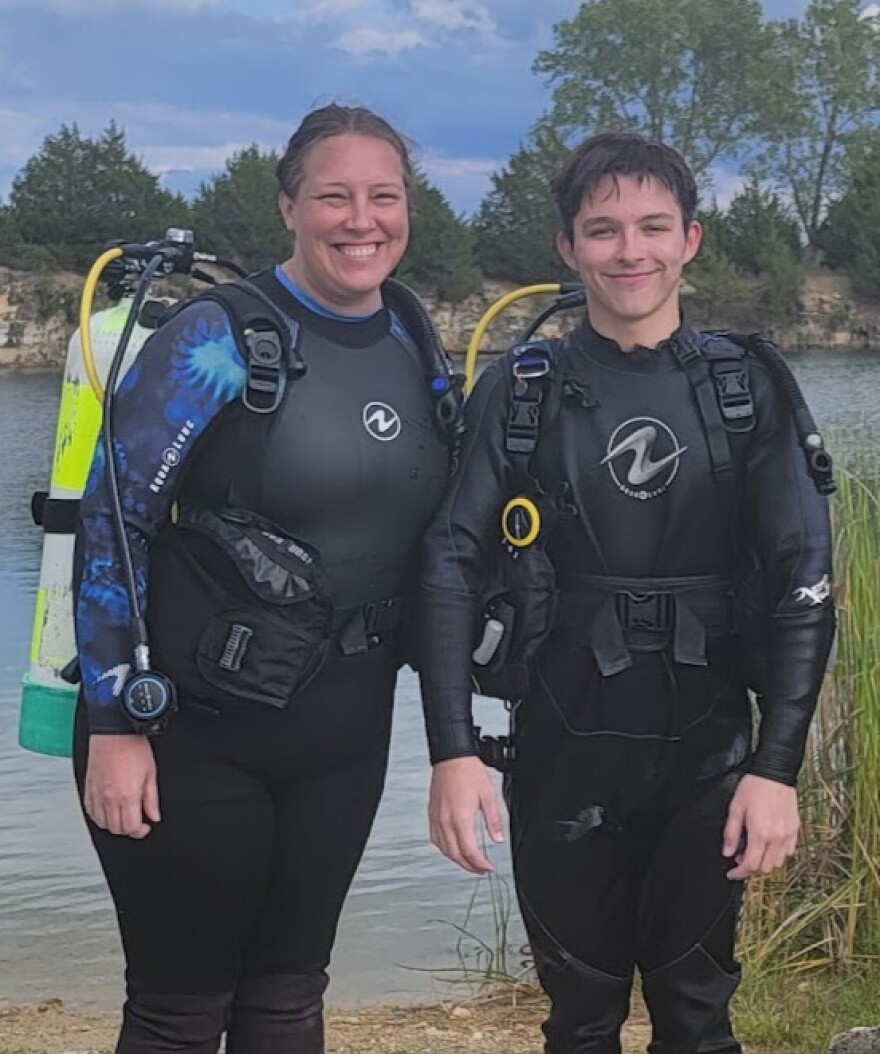 Eagle Scout John Hayes, of Troop 21 in the Great Rivers Council, stands next to his mom Amanda in St. Louis.