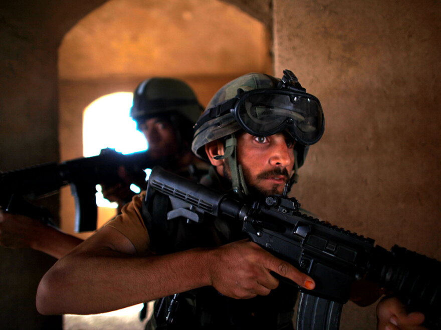 Afghan commandos train under U.S. Special Forces in Afghanistan. The Pentagon is sending 800 more American soldiers to Afghanistan in the coming weeks to work as trainers for the Afghan security forces.