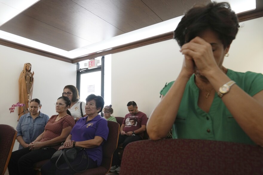Parishioners pray in the perpetual adoration chapel
