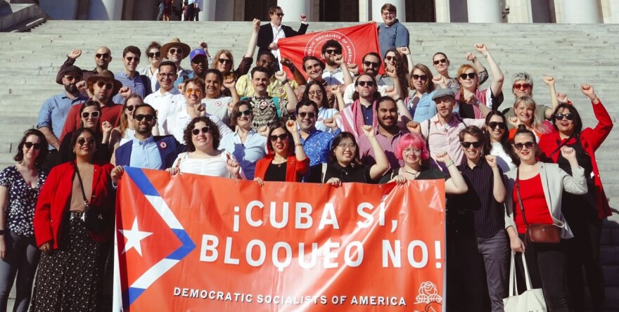A Democratic Socialists of America delegation in Havana, Cuba, in 2023. (The banner readers: Cuba Yes, Blockade No!)