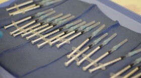 Syringes pre-loaded with doses of the COVID-19 vaccine await injection at a clinic in Soldotna on Friday, April 16, 2021. (Nat Herz/Alaska Public Media)