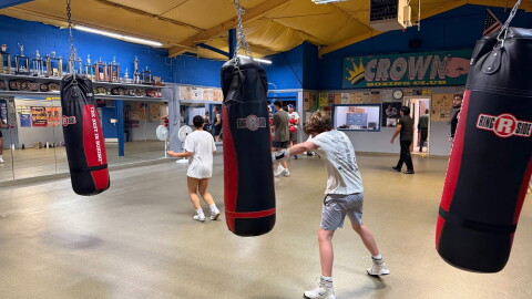 Valdez swings a left hook on his turn with the punching bags (Lansing, Sept. 21, 2026).