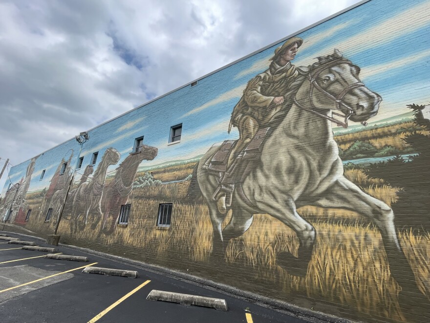 A mural showing a horse and rider of the Pony Express.