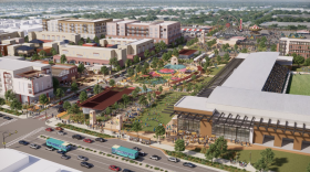 The New Mexico State Fair District Board on March 23, 2026, approved a master plan for the first phase of a state-funded fairgrounds redevelopment, featuring new housing, green space and a stadium, rendered above by design firm Stantec.