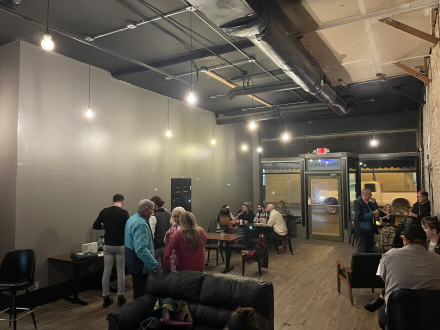 The small performance space was arranged with couches, tables and chairs on Friday.