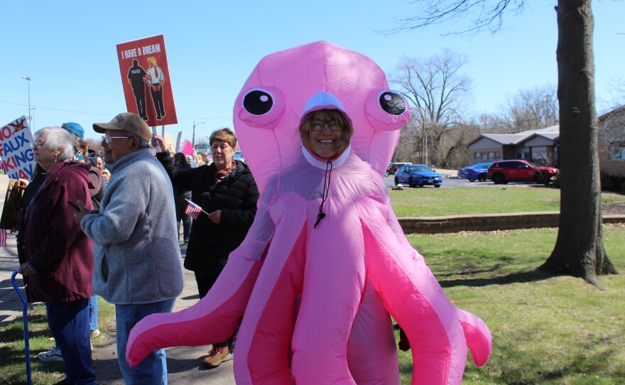 Wendy Lubers from the Peoria Area dresses as a octopus to "to protest the many fingers that Trump has and everything."