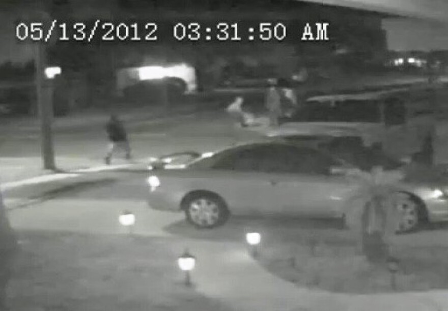 A still photo taken from the security camera that captured the attack.