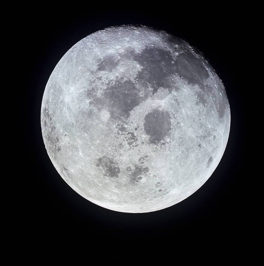 A view of the full moon photographed from the Apollo 11 spacecraft during its trans-Earth journey homeward. 