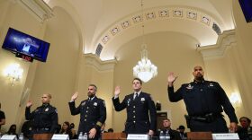 U.S. Capitol Police officer Sgt. Aquilino Gonell, DC Metropolitan Police Department officer Michael Fanone, DC Metropolitan Police Department officer Daniel Hodges and U.S. Capitol Police officer Harry Dunn are sworn in prior to testifying before the House Select Committee investigating the January 6 attack on the U.S. Capitol at the Cannon House Office Building in Washington, DC. 