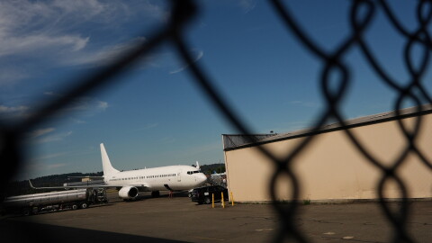 FILE - A U.S. Immigration and Customs Enforcement flight operates out of King County International Airport-Boeing Field, Aug. 23, 2025, in Seattle.