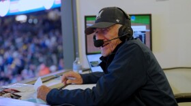 Bob Uecker in the broadcasting booth at American Family Field during a Brewers game.