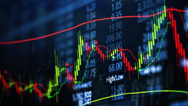Double exposure of candle stick graph chart with indicator with stock market price screen and city background, stock exchange trading, investment and financial concept idea.