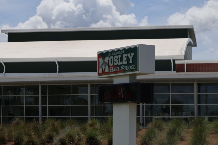 School sign for A Crawford Mosley high school.