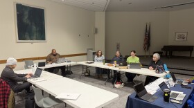 State and federal disaster response officials work at the Noel Wien Library Dec. 2, 2025, in Fairbanks, Alaska, to connect with evacuees from the devastating storm that struck Western Alaska in mid-October.