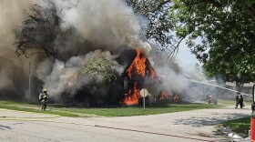Firefighters battle a house fire at 701 S. Center St. in Ft. Branch, July 28, 2026