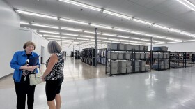 Montgomery County Commissioner Judy Dodge tours the new Clothes That Work warehouse on Wilmington Pike