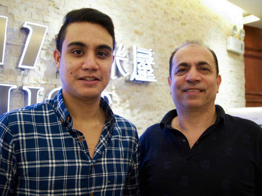 Khaled Birouti (right) runs the Shami House restaurant with his son, Anas.