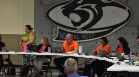Unit 5's board meets in Normal West's cafeteria on June 12, 2024